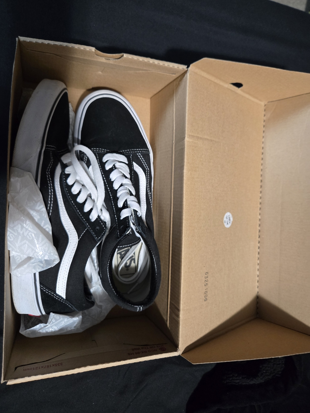 Vans Black and White Low-Top Canvas Sneakers